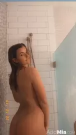 Mia Melano taking a shower